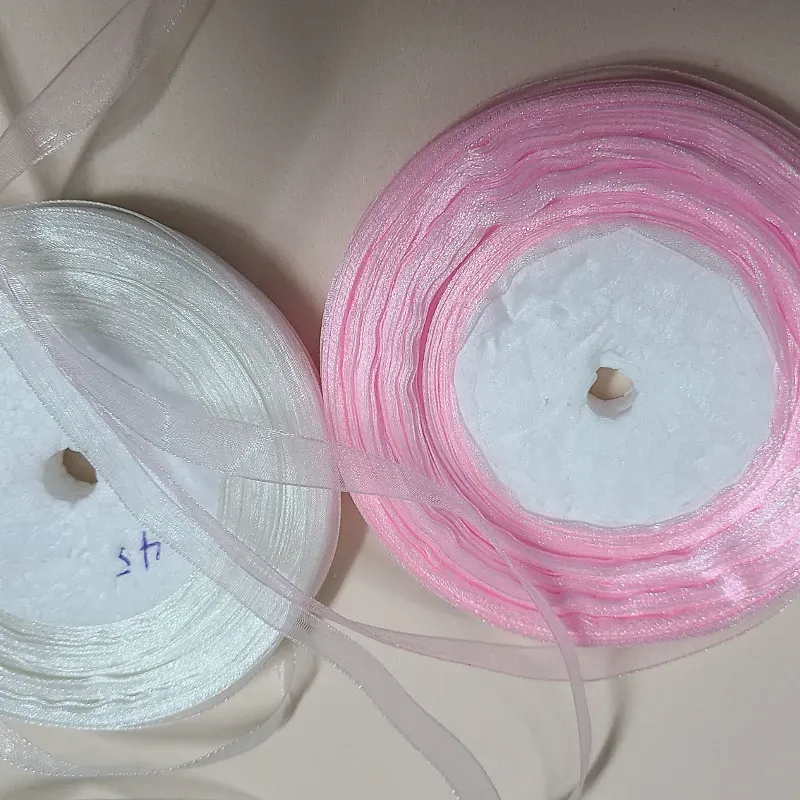 Cinta horganza de 1 cm.rosada y bñanca