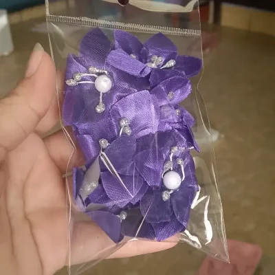 Estuche de 6 flores violetas