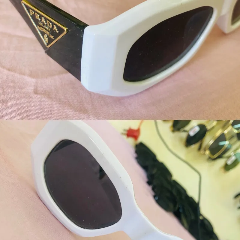 Gafas de sol con lentes oscuros y detalles en la armadura