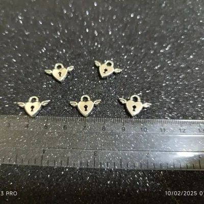 Dije de corazón ❤️ con candado