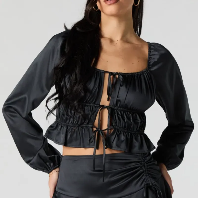 Blusa negra mangas alargadas