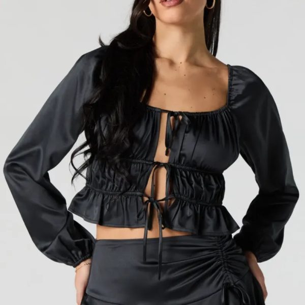 Blusa negra mangas alargadas