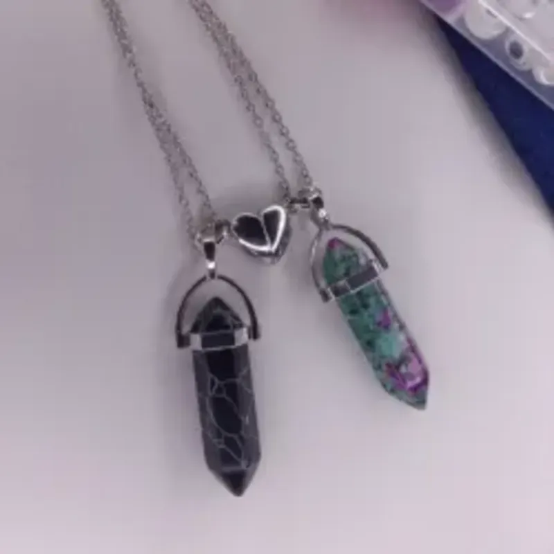 Pareja de péndulos con corazón magnético