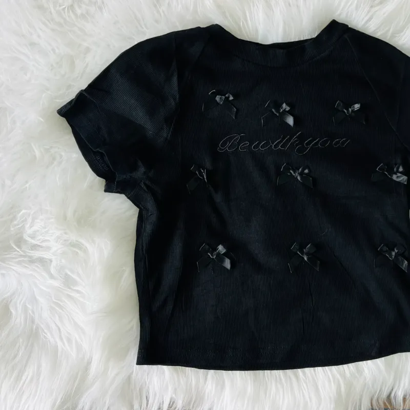 Pulover de lazitos negro