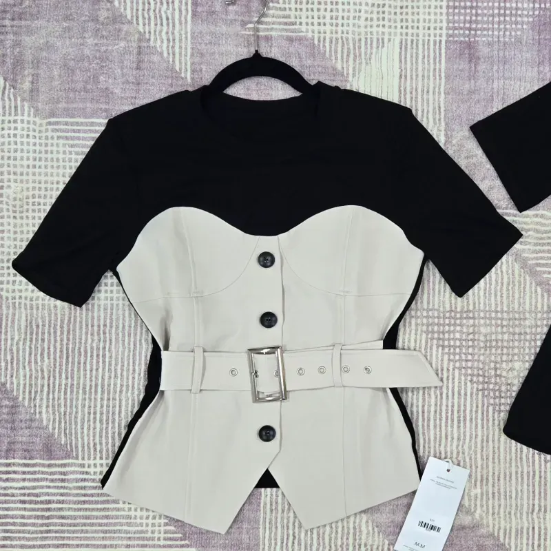 Pulover negro con chaleco