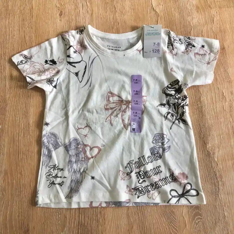 Pulóver color crema con dibujos