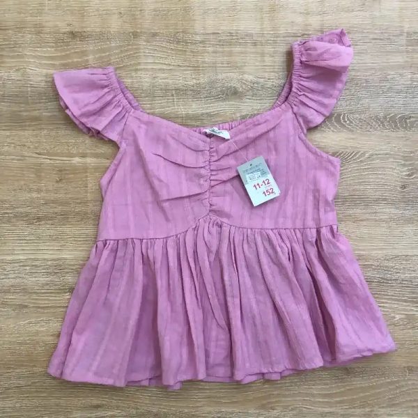 Blusa color rosado con vuelos