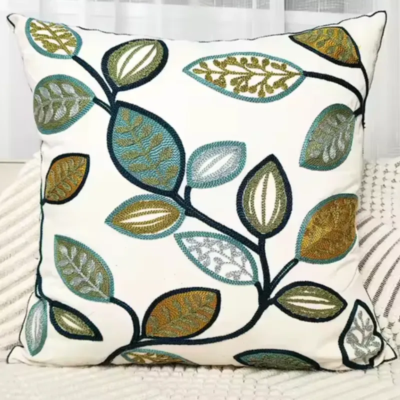 Cojin de hojas bordado en tonos azules