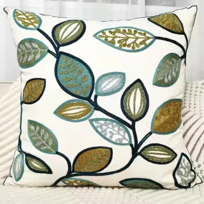 Cojin de hojas bordado en tonos azules