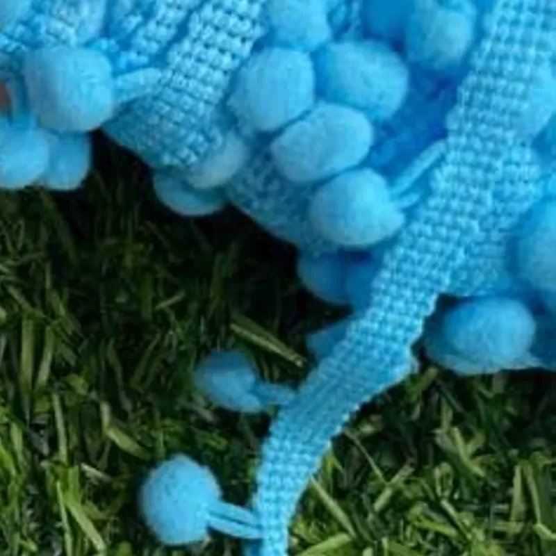 Tira pompón azul