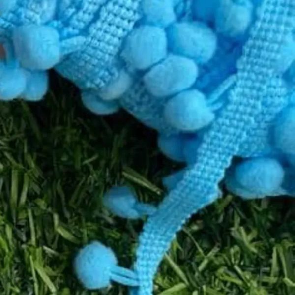 Tira pompón azul