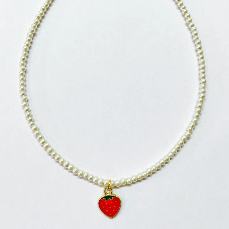 Collar de perlas con dije