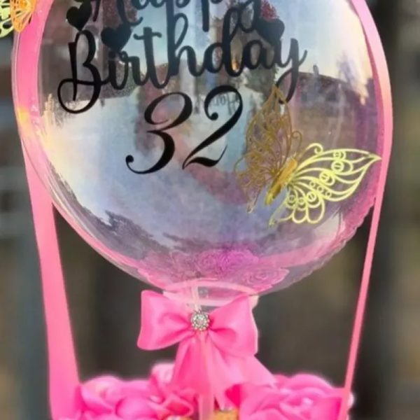 Detalle rosas eternas +globo burbuja+6 bombones