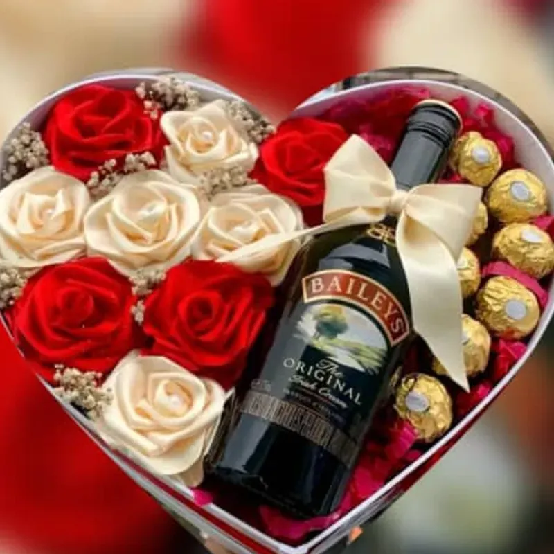 Corazón 8 ferreros +9 rosas eternas +botella de vino