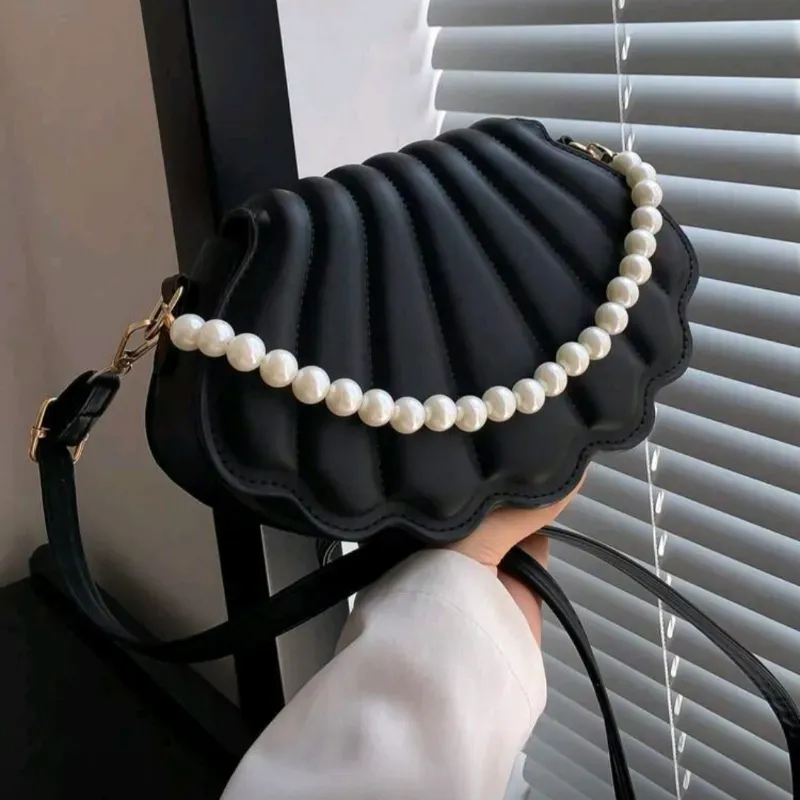 Cartera concha negra