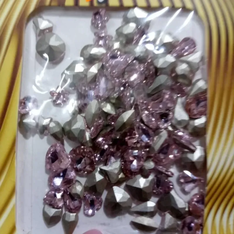 Joyería Variada Rosada Studio Nails