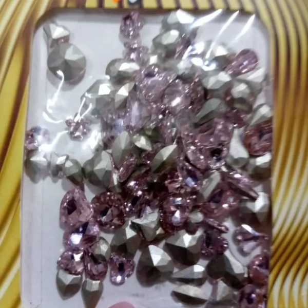 Joyería Variada Rosada Studio Nails