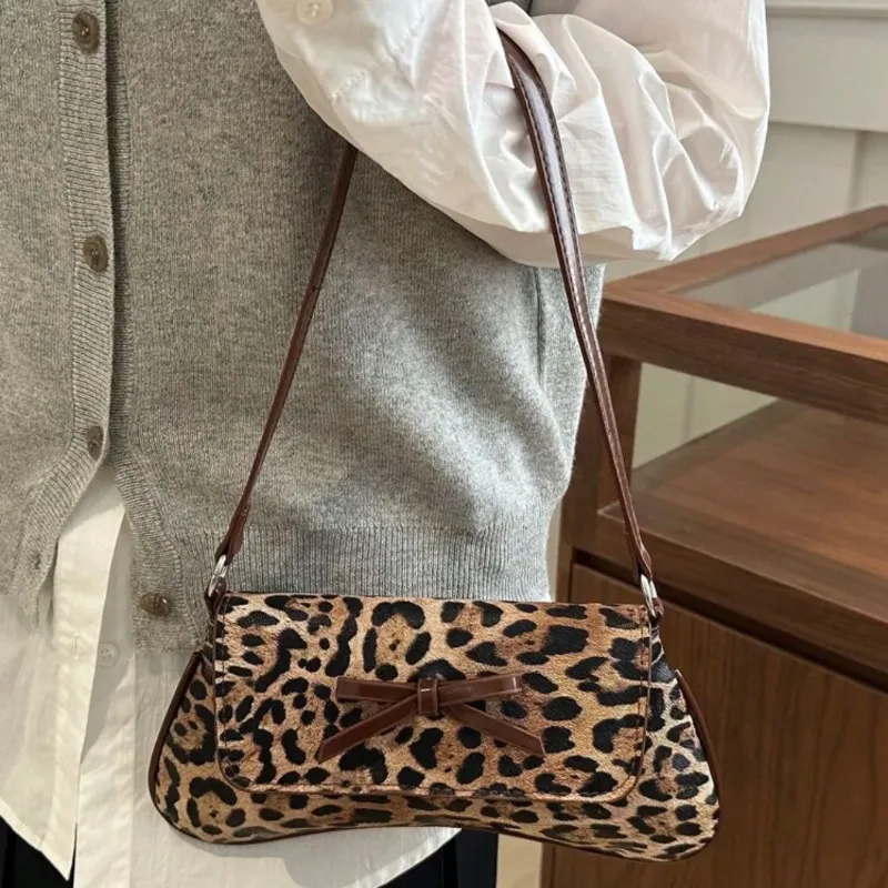 Cartera elegante animal print