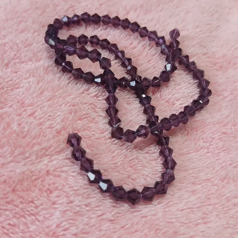 Swaroskis rombo sueltos morado oscuro 4 mm