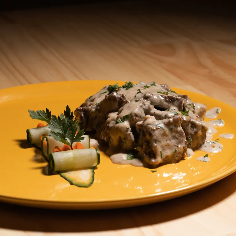 PUNTAS DE FILETE EN SALSA DE QUESO PARMESANO