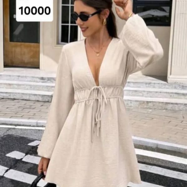 Vestido beige con mangas