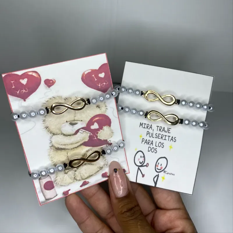 Pareja Pulseras perlas con signo infinito