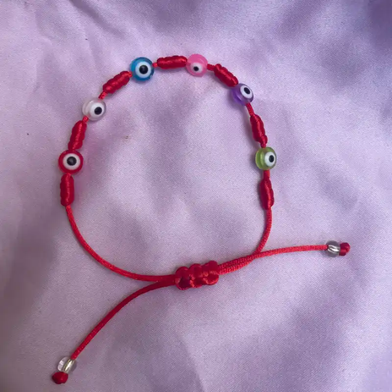 Pulsera 7 nudos con varios ojitos turcos