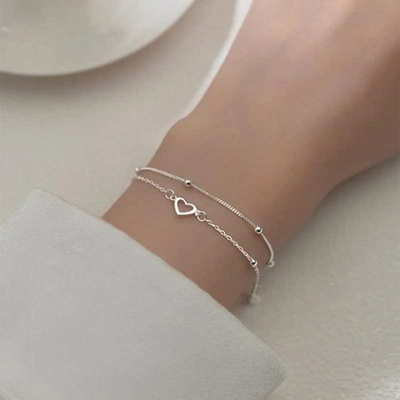 Pulsera doble con corazón