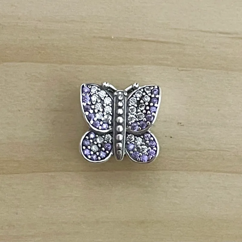 Charm Mariposa Brillo Morado