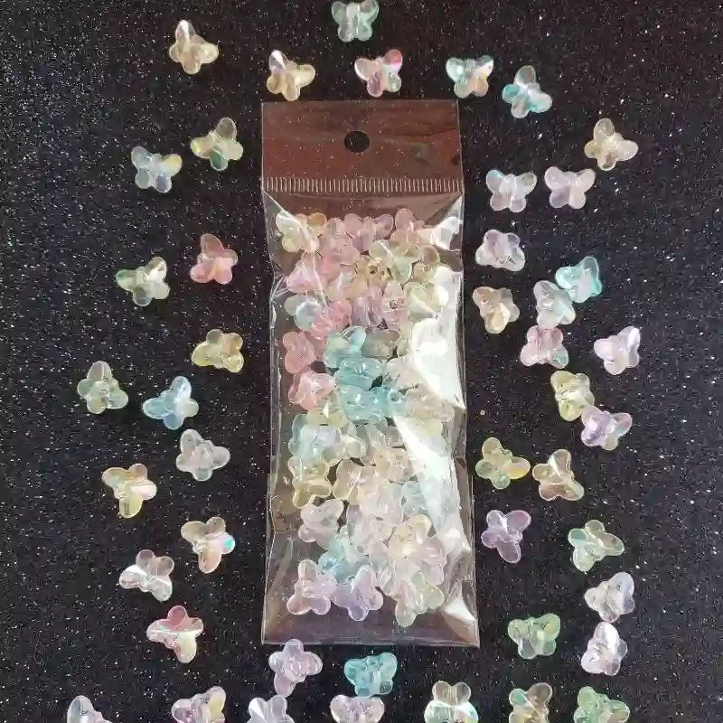 Cuentas de maripositas acrílicas transparentes