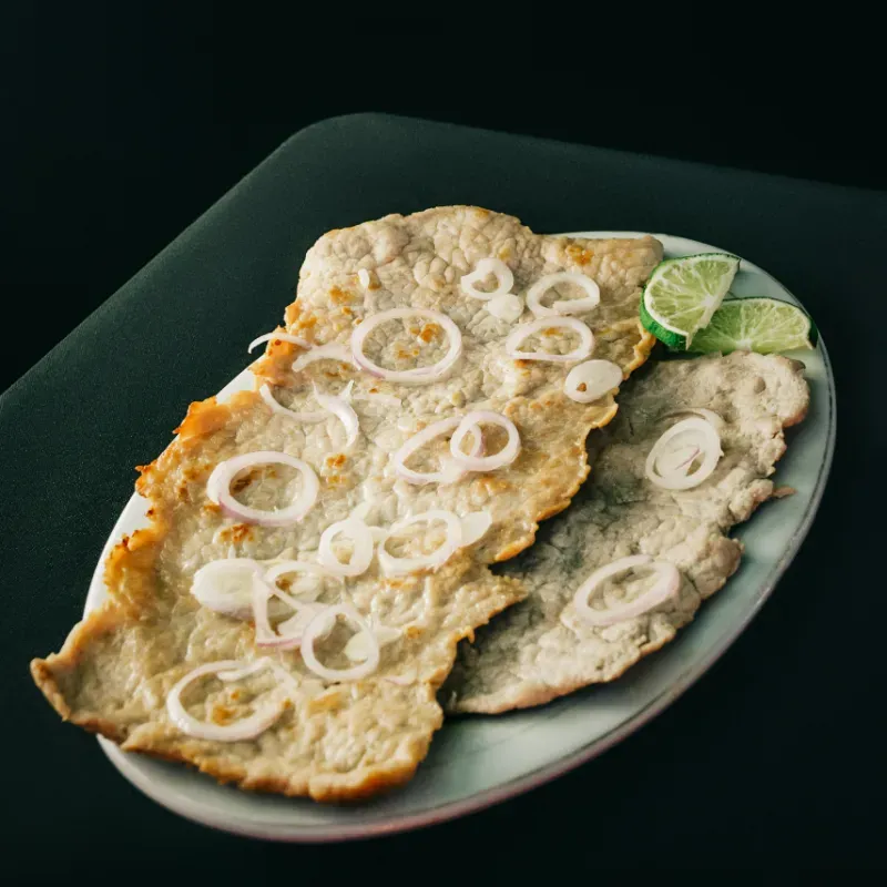 Bistec de Cerdo Encebollado