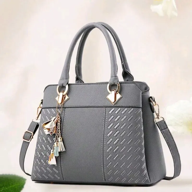 Bolso elegante doble asa con adorno