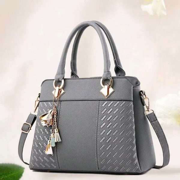 Bolso elegante doble asa con adorno