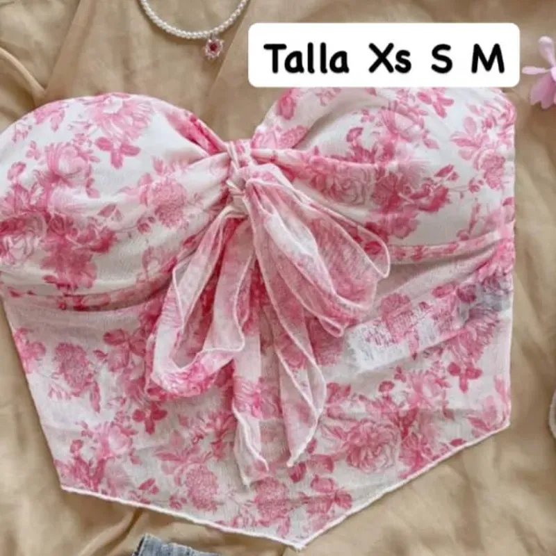 Top con estampado floral y lazo frontal