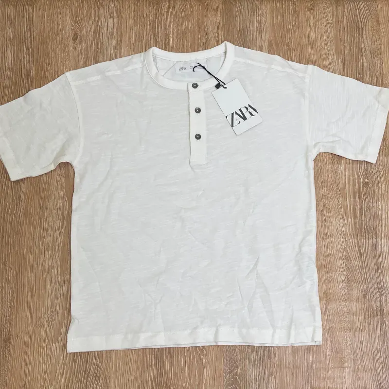 Pulóver con botones color blanco