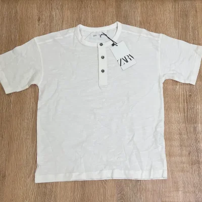 Pulóver con botones color blanco