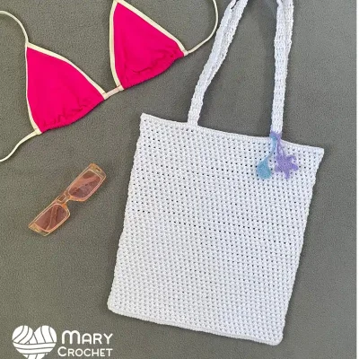 Bolsito playero con adornos marinos