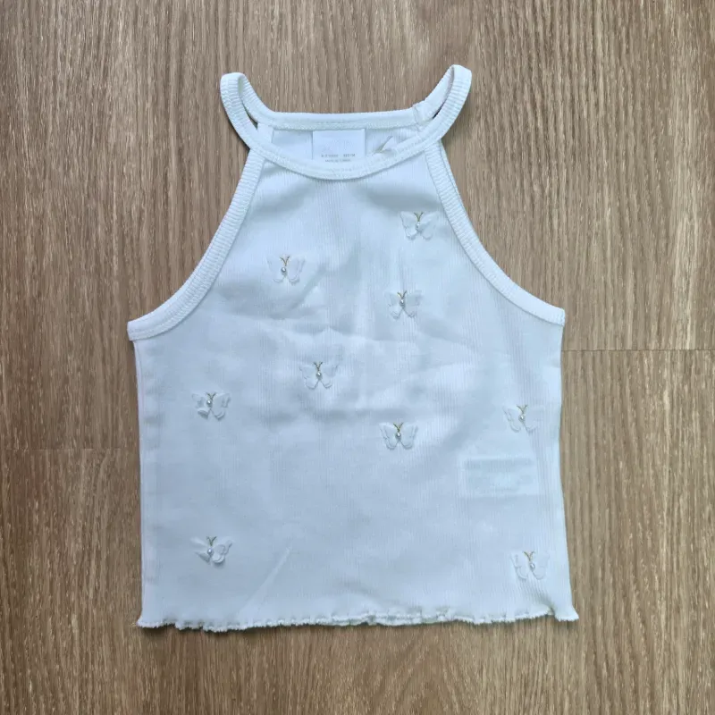 Blusa blanca de canalé con mariposas 