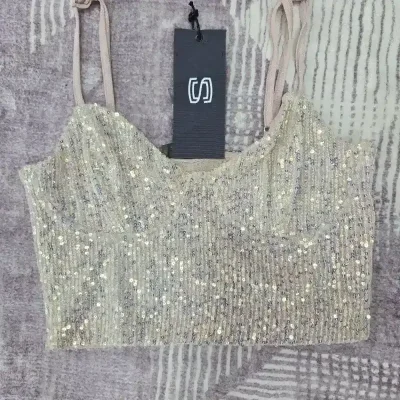 Top corto de brillos