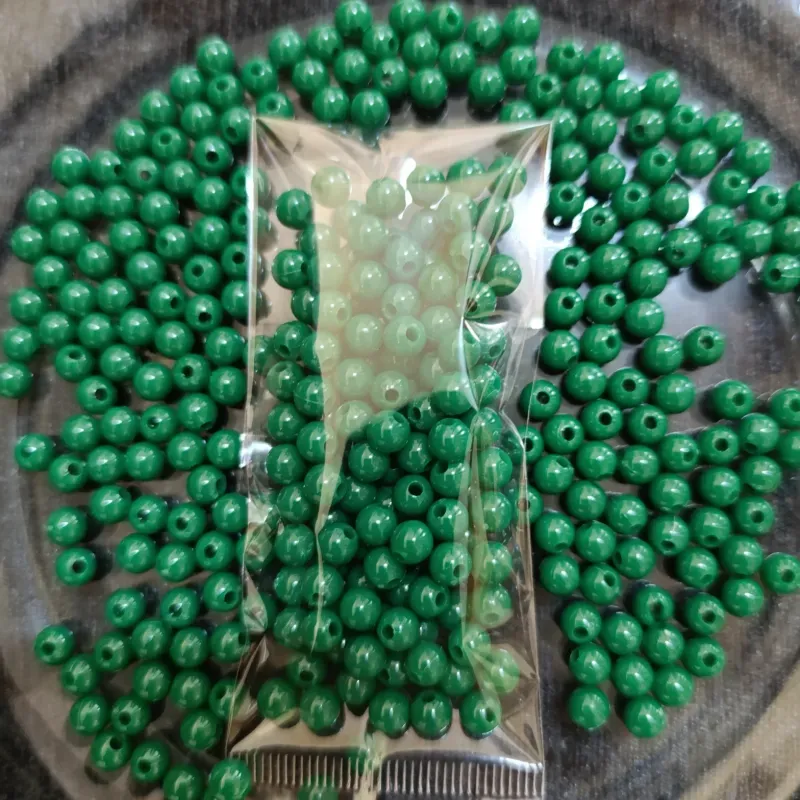 Perla plástica de 6 mm color verde 