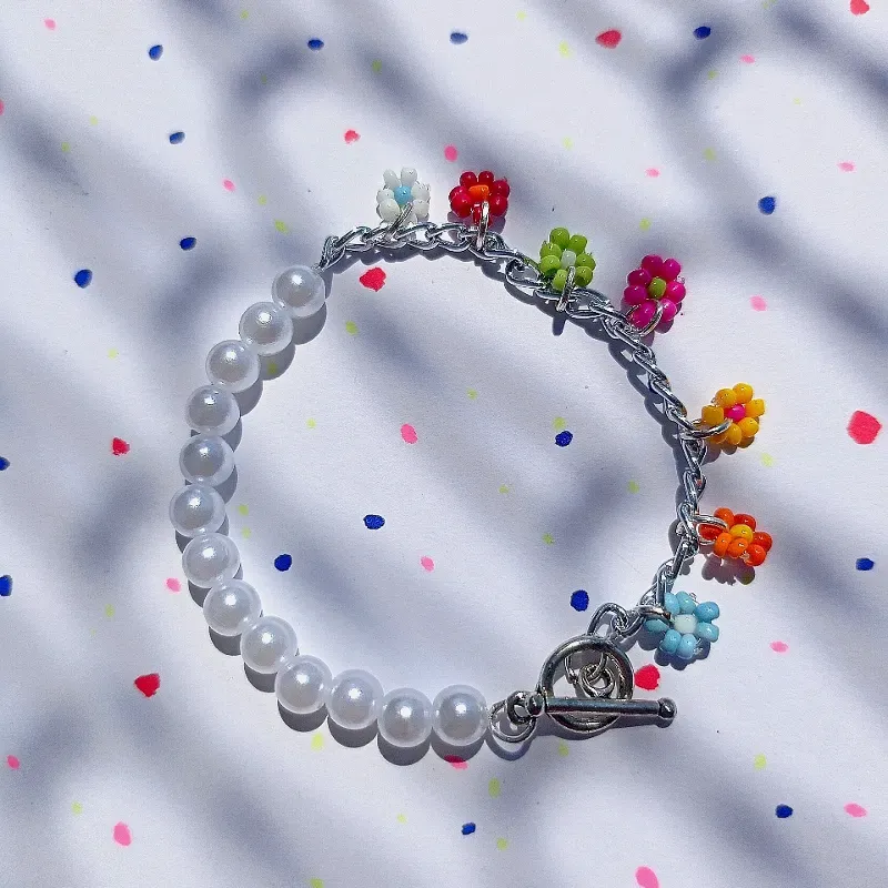 Pulsera de cadena y flores