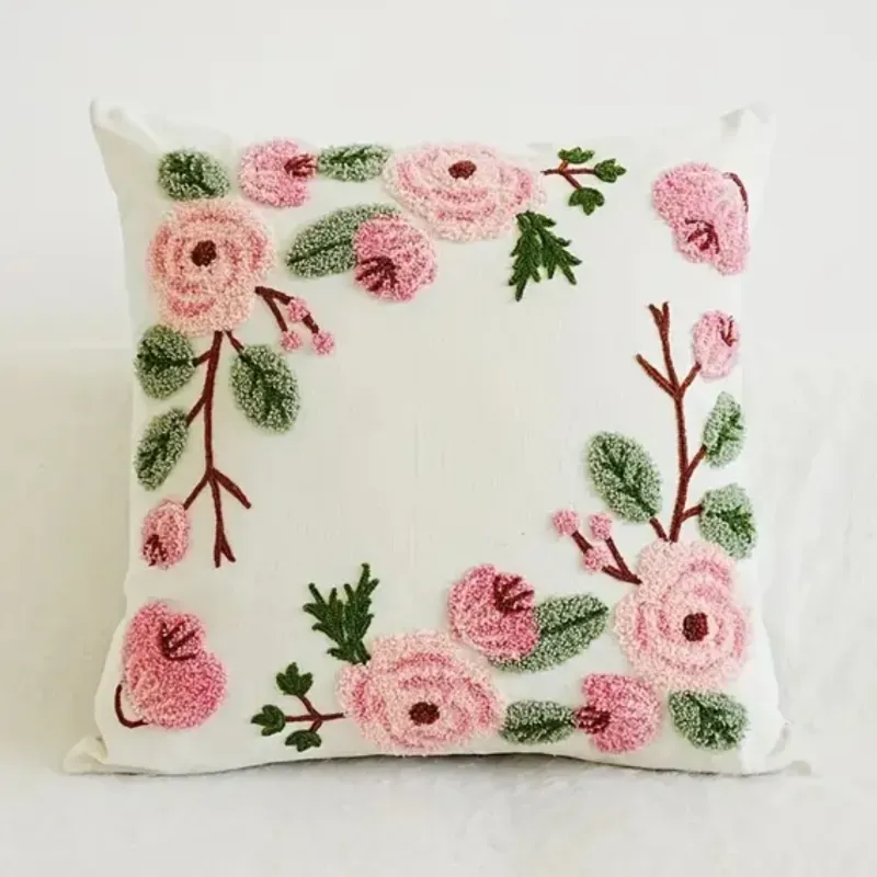Cojín de rosas bordado