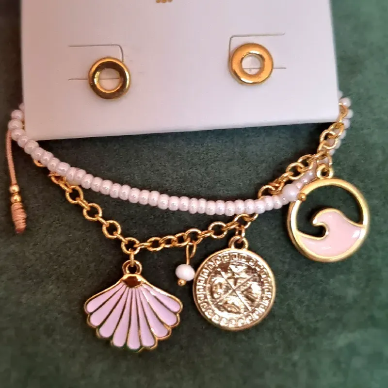 Set de pulseras dijes marinos +aretes