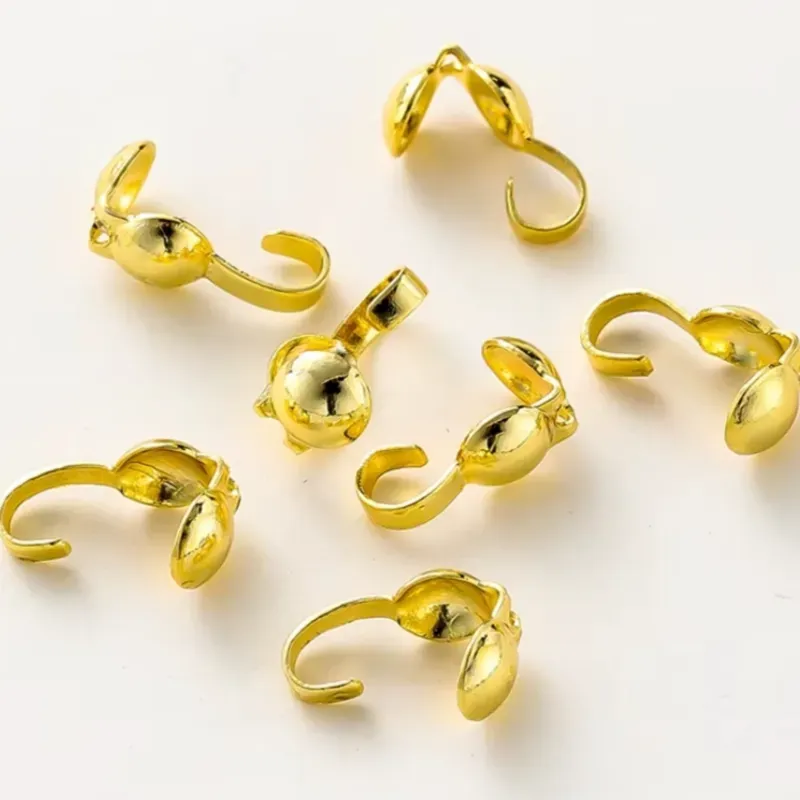 Tapanudos dorados con gancho terminal