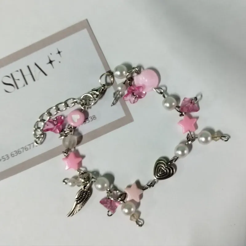 Pulsera en tonos rosados