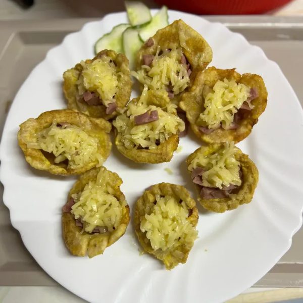 Tostones rellenos con jamón y queso