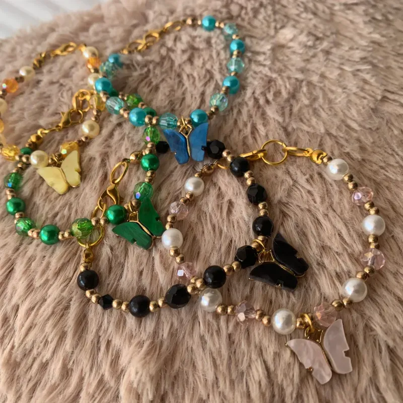 Pulsera de Perlas, Swarosky y mariposa