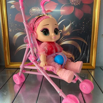 Cochecito con Muñeca