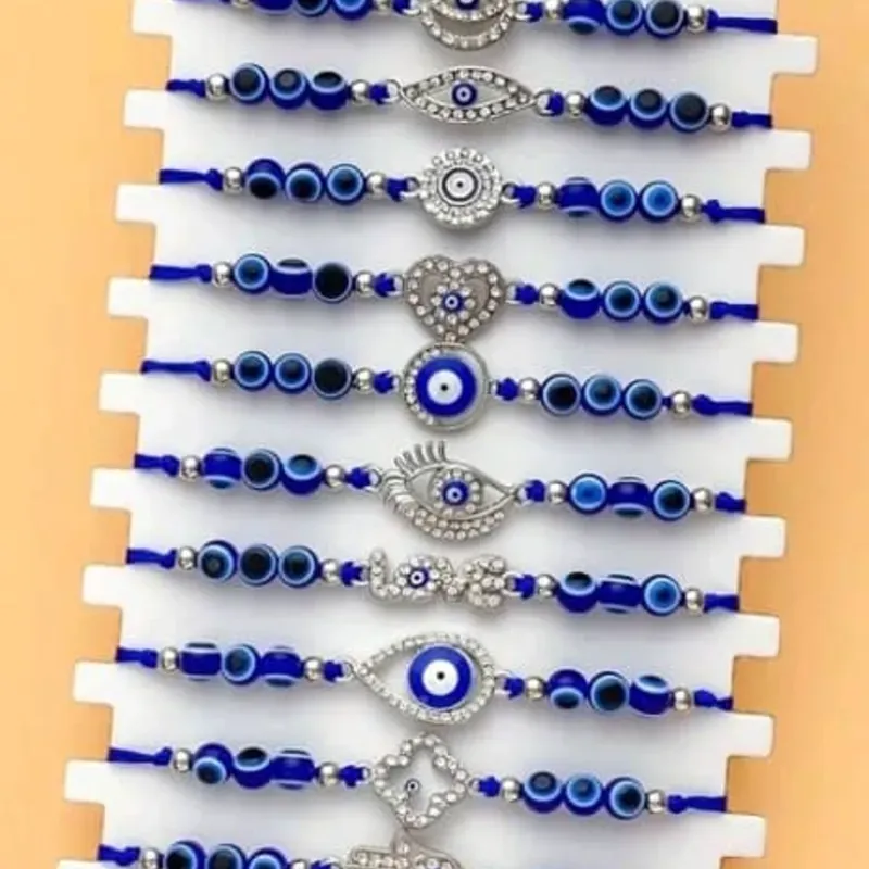 Pulsera tejida con ojitos en azul