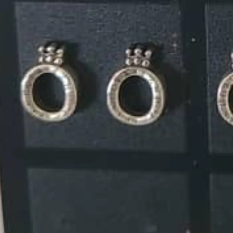 Aretes PANDORA ( O CORONA)